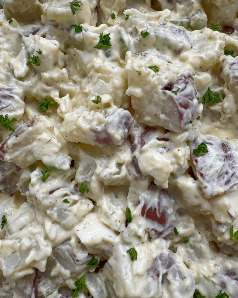 close up shot of red skin potato salad