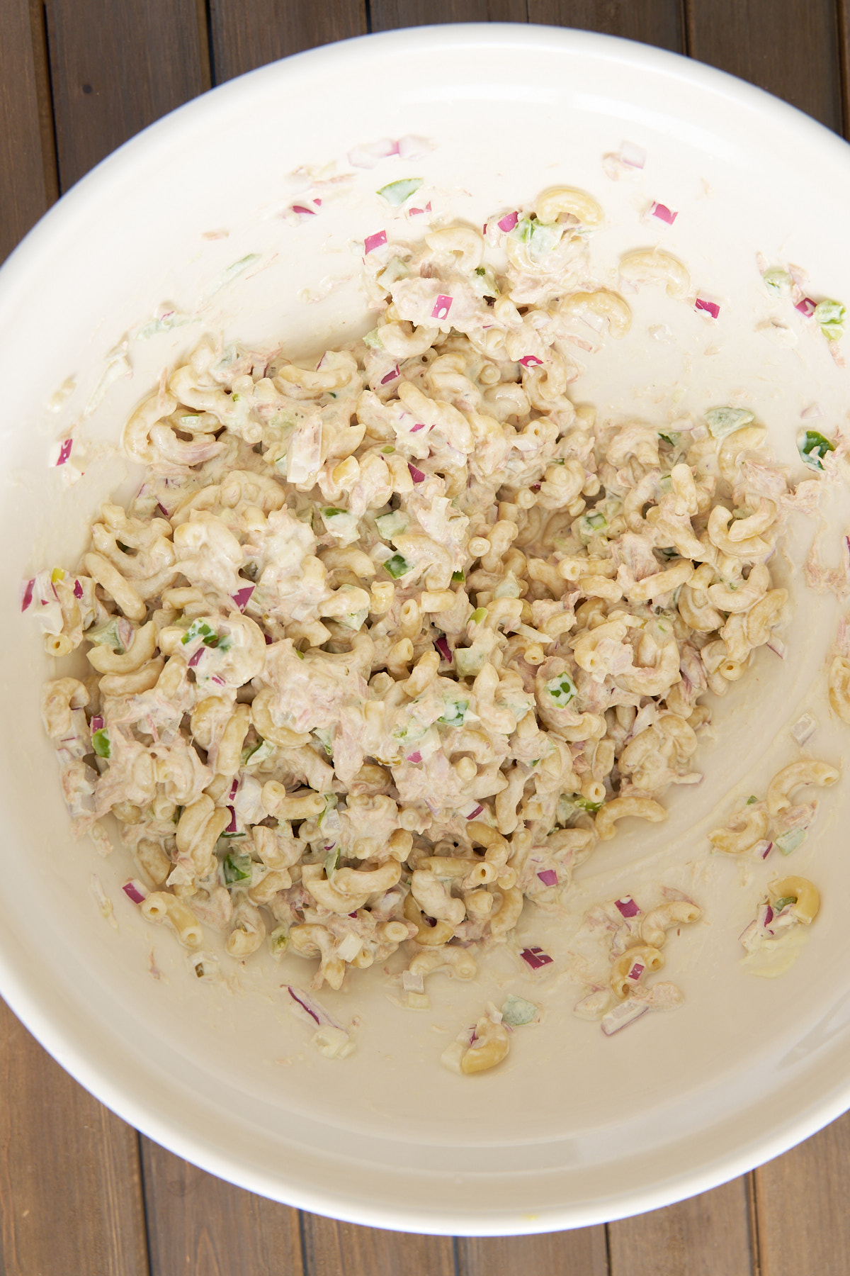 tuna salad tossed in a large bowl