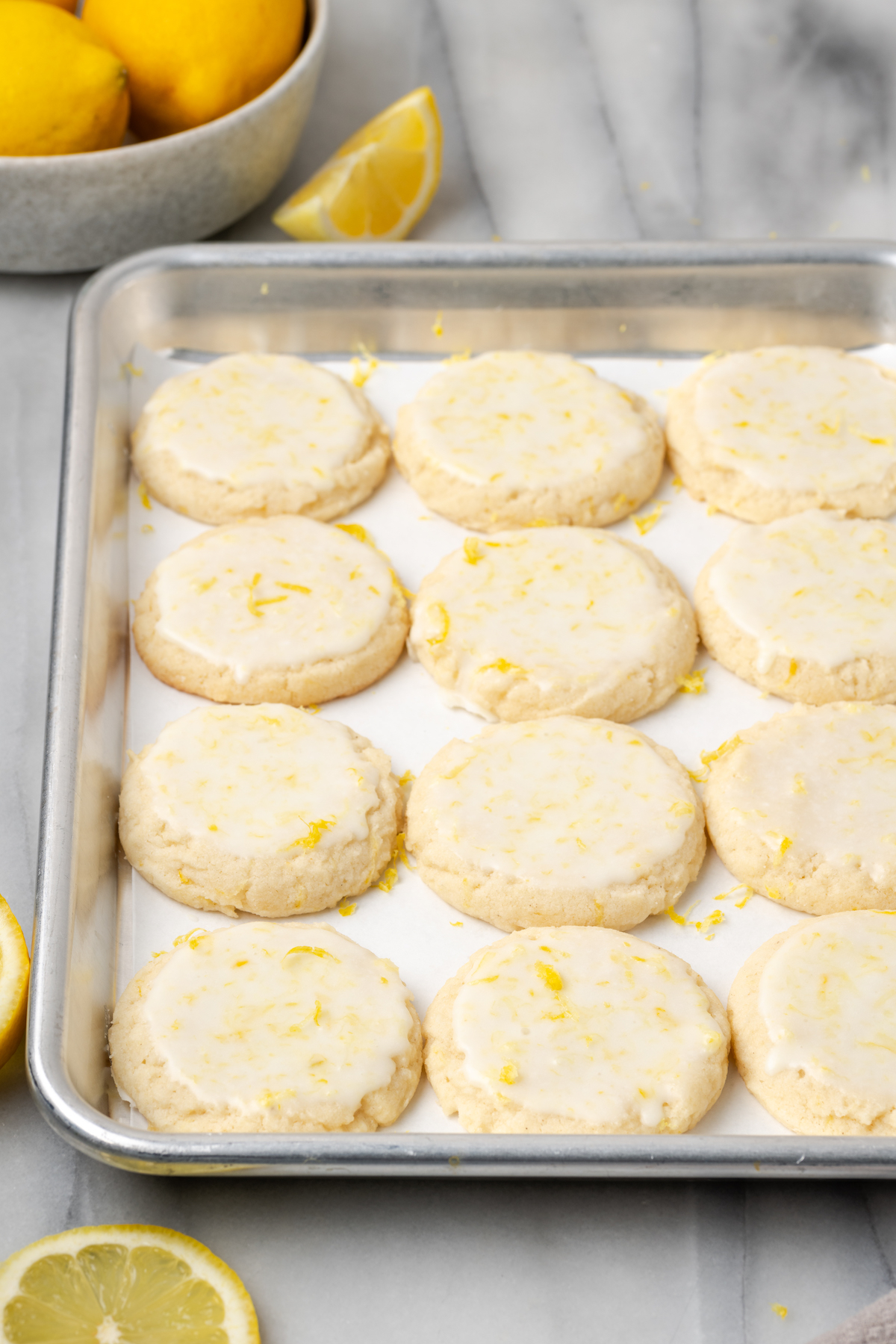 Lemon cookies on parchment lined pan