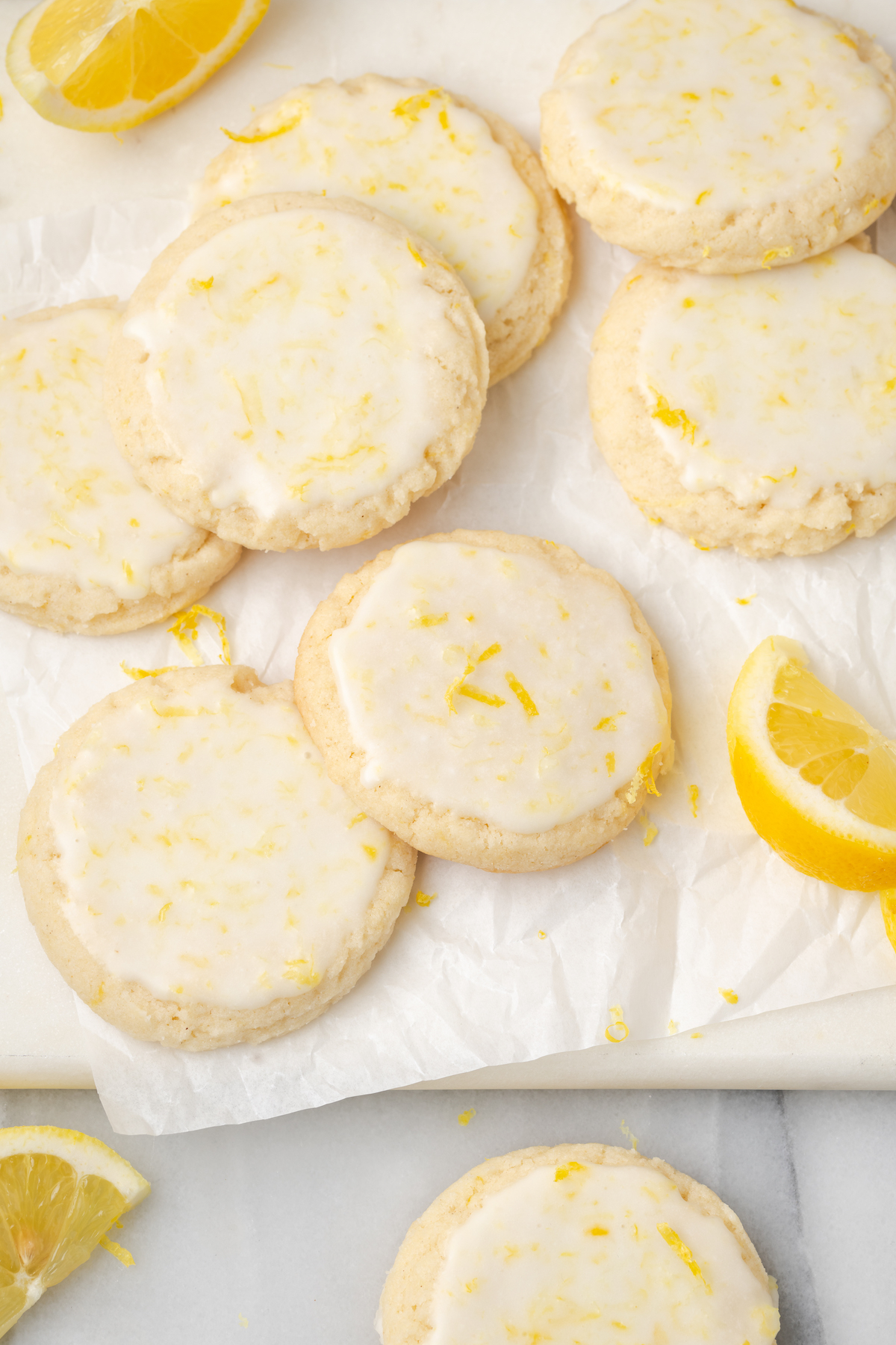 Overhead view of lemon cookies topped with lemon zest
