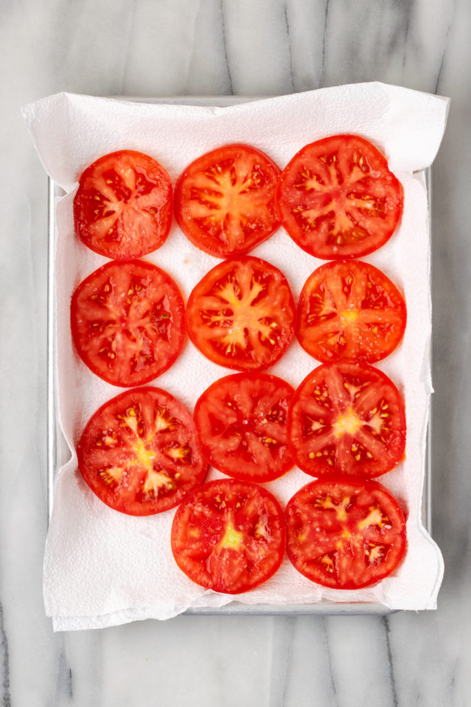 Overhead view of salted tomatoes