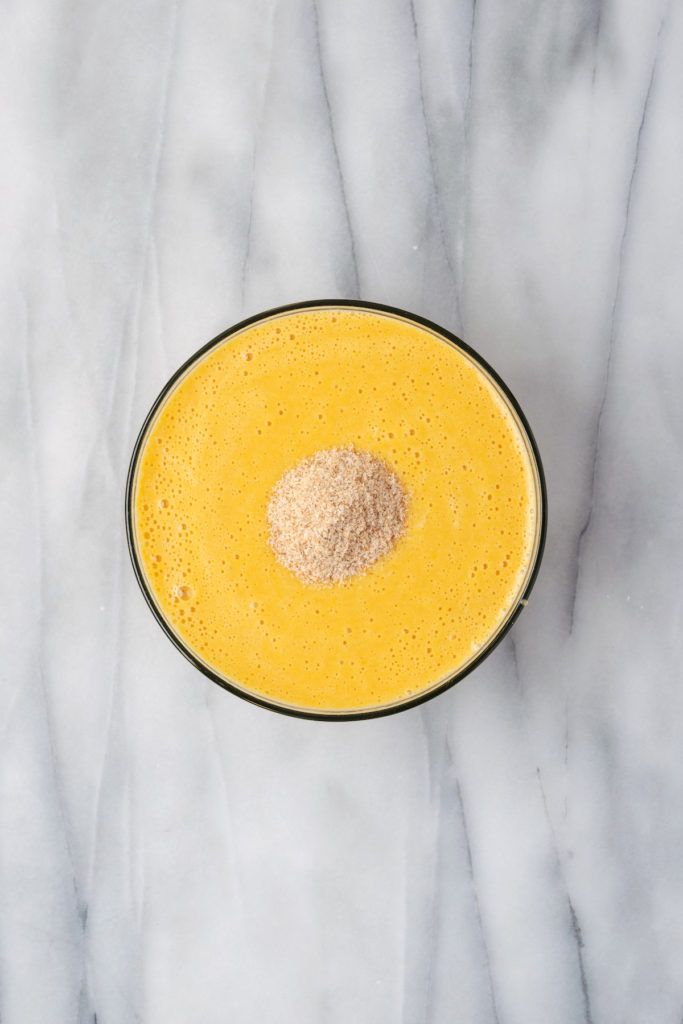 Overhead view of psyllium added to sweet potato mixture