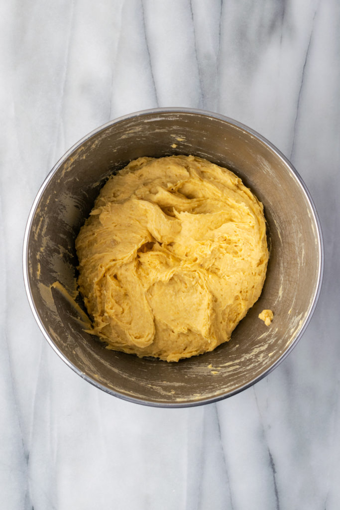 Overhead view of sweet potato roll dough in bowl