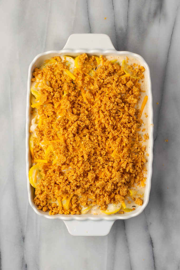 Overhead view of squash casserole in dish before baking