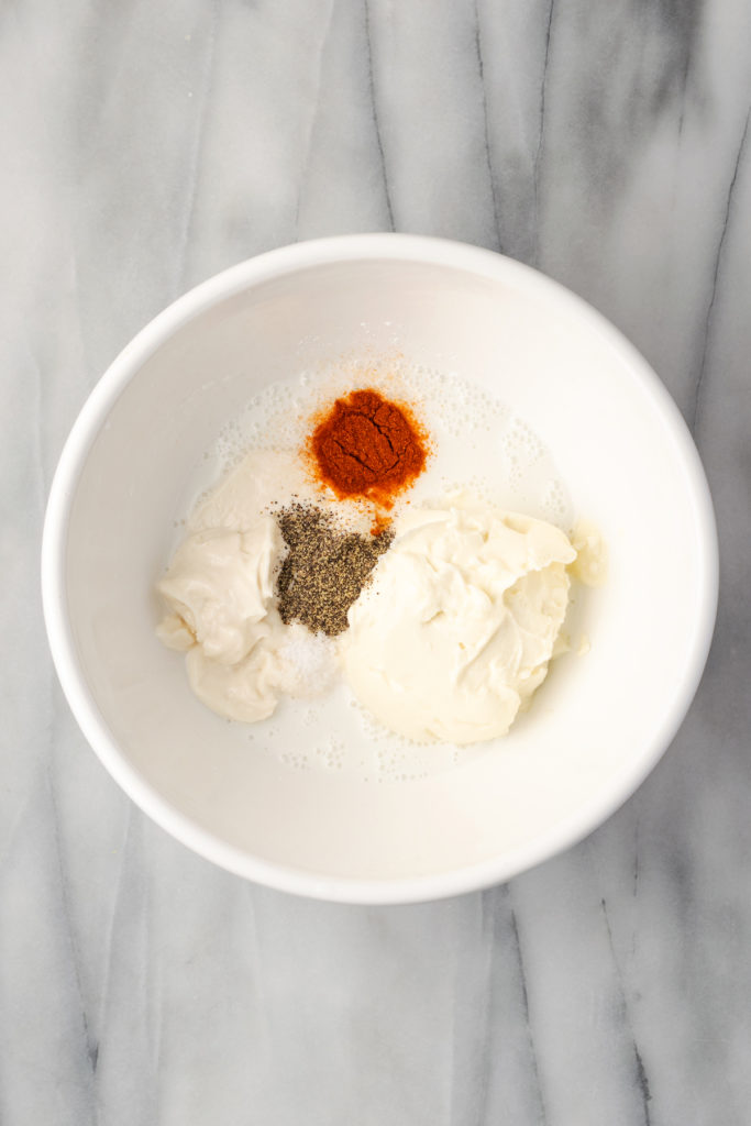 Overhead view of sauce ingredients in bowl